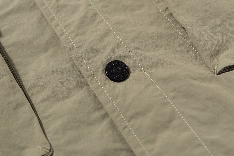 detail kaki bouton compass