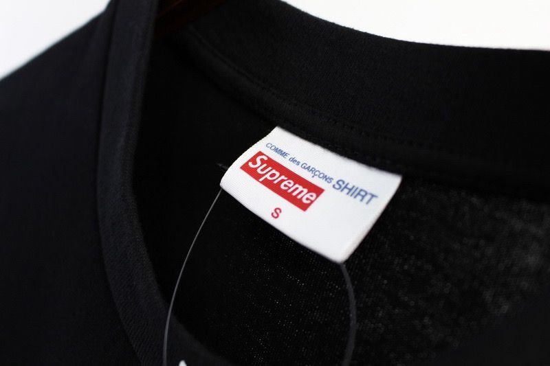 noir detail etiquette cdg