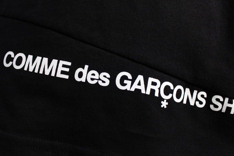 noir detail dos texte cdg